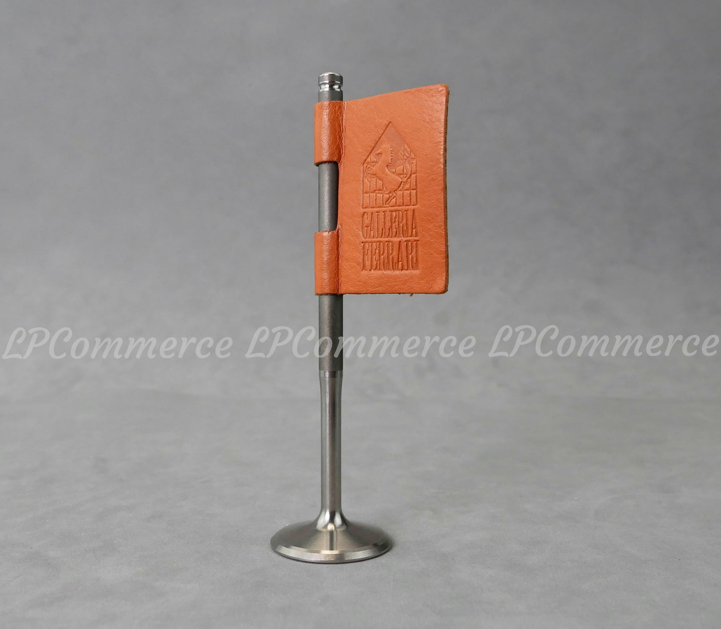 Fermacarte Ferrari valvola motore F1 gadget galleria esposizione badge vintage